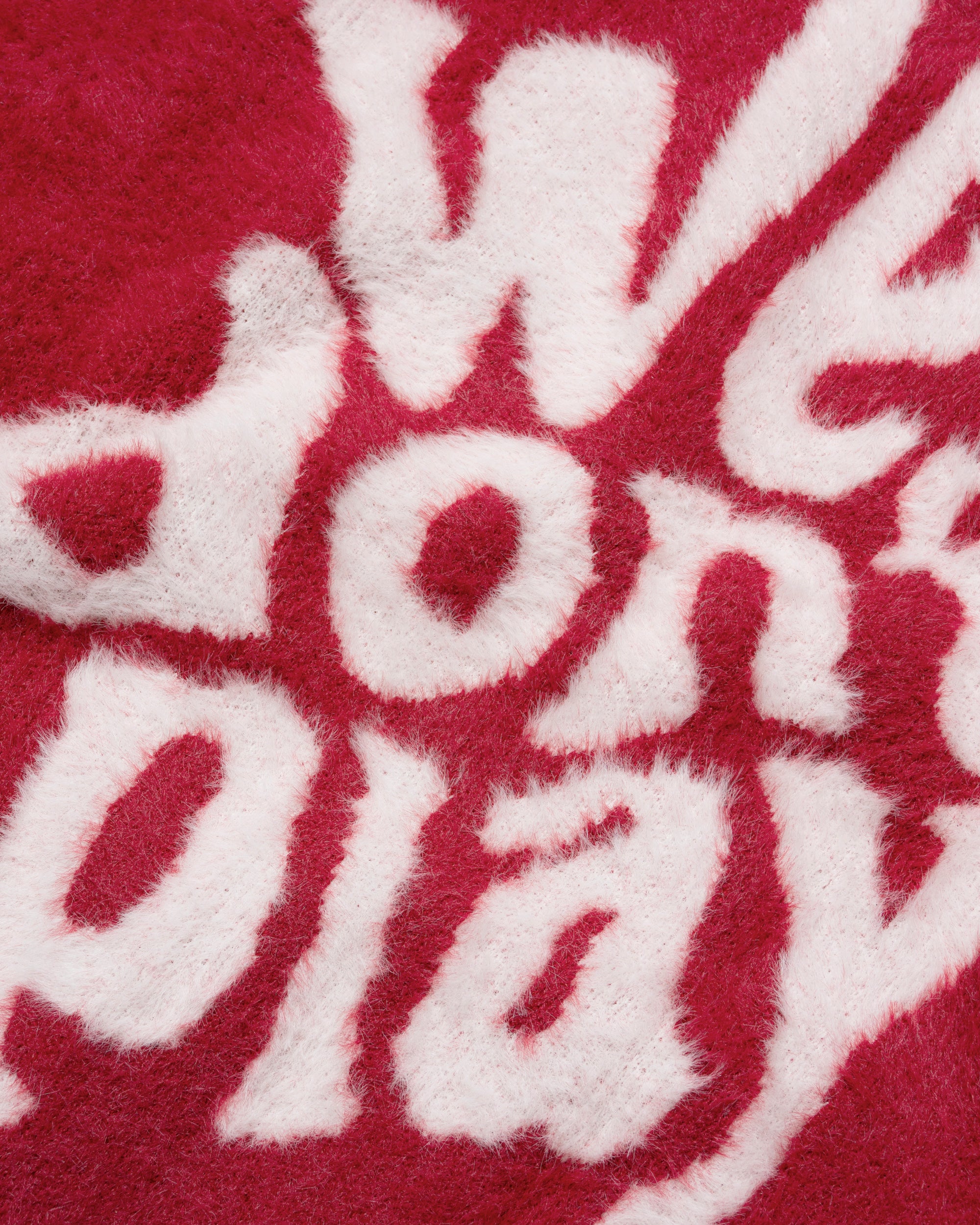 Red We Don't Play Sweater, close-up